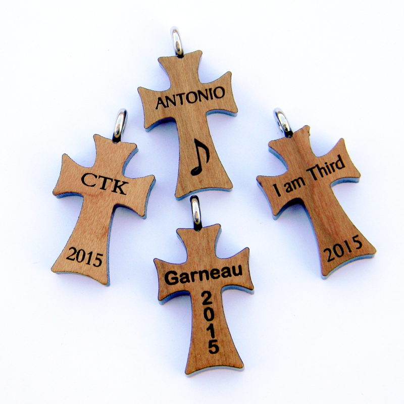 39E - Cruz de madera, pez